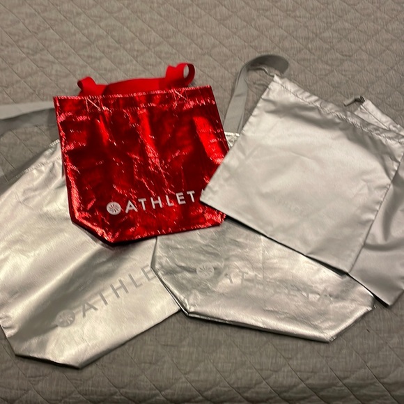 Five Athleta bags: 2 large silver, 1 med metallic red & 2 mix size metallic bags - Picture 1 of 4